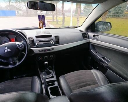 Черный Мицубиси Лансер, объемом двигателя 2 л и пробегом 200 тыс. км за 5100 $, фото 2 на Automoto.ua