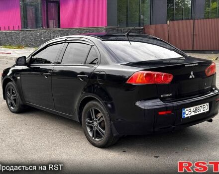 Черный Мицубиси Лансер, объемом двигателя 1.5 л и пробегом 250 тыс. км за 6700 $, фото 4 на Automoto.ua