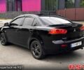 Черный Мицубиси Лансер, объемом двигателя 1.5 л и пробегом 250 тыс. км за 6700 $, фото 4 на Automoto.ua