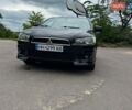 Черный Мицубиси Лансер, объемом двигателя 1.5 л и пробегом 178 тыс. км за 7500 $, фото 1 на Automoto.ua