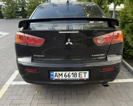 Чорний Міцубісі Lancer, об'ємом двигуна 2 л та пробігом 215 тис. км за 6700 $, фото 1 на Automoto.ua