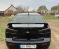 Чорний Міцубісі Lancer, об'ємом двигуна 2 л та пробігом 180 тис. км за 7500 $, фото 2 на Automoto.ua