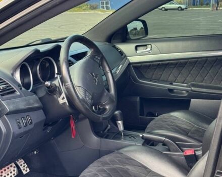 Черный Мицубиси Лансер, объемом двигателя 2 л и пробегом 297 тыс. км за 7500 $, фото 5 на Automoto.ua