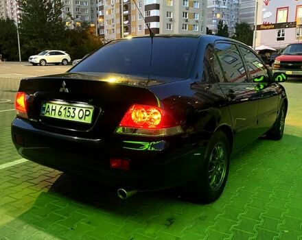 Чорний Міцубісі Lancer, об'ємом двигуна 1.6 л та пробігом 280 тис. км за 4700 $, фото 5 на Automoto.ua