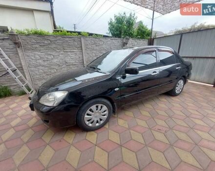 Чорний Міцубісі Lancer, об'ємом двигуна 1.6 л та пробігом 215 тис. км за 4900 $, фото 3 на Automoto.ua