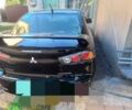 Чорний Міцубісі Lancer, об'ємом двигуна 2 л та пробігом 3 тис. км за 5529 $, фото 1 на Automoto.ua