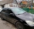 Черный Мицубиси Лансер, объемом двигателя 1.6 л и пробегом 126 тыс. км за 4500 $, фото 3 на Automoto.ua