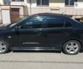 Чорний Міцубісі Lancer, об'ємом двигуна 2 л та пробігом 257 тис. км за 5500 $, фото 5 на Automoto.ua