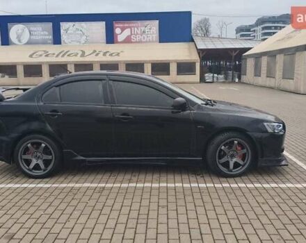 Чорний Міцубісі Lancer, об'ємом двигуна 2 л та пробігом 160 тис. км за 8000 $, фото 2 на Automoto.ua