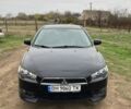 Чорний Міцубісі Lancer, об'ємом двигуна 2 л та пробігом 180 тис. км за 7500 $, фото 1 на Automoto.ua