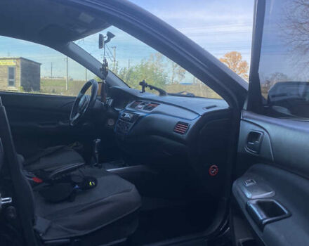 Мицубиси Лансер 2008 в Киеве на Automoto.ua Черный Мицубиси Лансер, объемом двигателя 1.6 л и пробегом 72 тыс. км за 2650 $, фото 9 на Automoto.ua