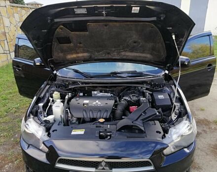 Міцубісі Lancer 2008 у Києві на Automoto.ua Чорний Міцубісі Lancer, об'ємом двигуна 2 л та пробігом 196 тис. км за 5500 $, фото 23 на Automoto.ua