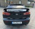 Черный Мицубиси Лансер, объемом двигателя 2 л и пробегом 270 тыс. км за 5200 $, фото 7 на Automoto.ua