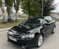 Чорний Міцубісі Lancer, об'ємом двигуна 2 л та пробігом 200 тис. км за 6800 $, фото 1 на Automoto.ua