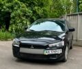 Черный Мицубиси Лансер, объемом двигателя 2 л и пробегом 129 тыс. км за 6000 $, фото 1 на Automoto.ua