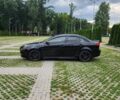 Черный Мицубиси Лансер, объемом двигателя 2 л и пробегом 190 тыс. км за 6500 $, фото 3 на Automoto.ua