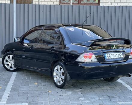 Міцубісі Lancer 2008 у Синельниковом на Automoto.ua Чорний Міцубісі Lancer, об'ємом двигуна 1.6 л та пробігом 230 тис. км за 4500 $, фото 7 на Automoto.ua