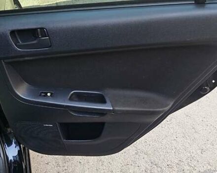 Черный Мицубиси Лансер, объемом двигателя 1.5 л и пробегом 205 тыс. км за 6300 $, фото 9 на Automoto.ua