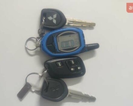 Чорний Міцубісі Lancer, об'ємом двигуна 1.6 л та пробігом 300 тис. км за 5500 $, фото 11 на Automoto.ua