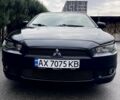 Чорний Міцубісі Lancer, об'ємом двигуна 2 л та пробігом 217 тис. км за 5800 $, фото 2 на Automoto.ua