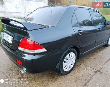Мицубиси Лансер 2008 в Прилуках на Automoto.ua Черный Мицубиси Лансер, объемом двигателя 1.58 л и пробегом 219 тыс. км за 4900 $, фото 5 на Automoto.ua