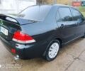 Мицубиси Лансер 2008 в Прилуках на Automoto.ua Черный Мицубиси Лансер, объемом двигателя 1.58 л и пробегом 219 тыс. км за 4900 $, фото 5 на Automoto.ua