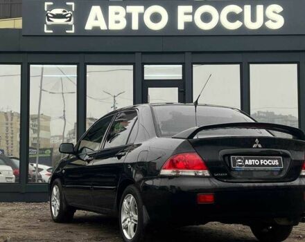 Чорний Міцубісі Lancer, об'ємом двигуна 0 л та пробігом 340 тис. км за 6190 $, фото 4 на Automoto.ua