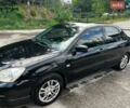 Чорний Міцубісі Lancer, об'ємом двигуна 1.58 л та пробігом 301 тис. км за 4000 $, фото 1 на Automoto.ua