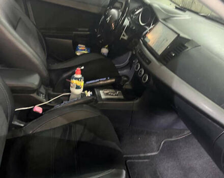 Черный Мицубиси Лансер, объемом двигателя 2 л и пробегом 200 тыс. км за 8000 $, фото 20 на Automoto.ua