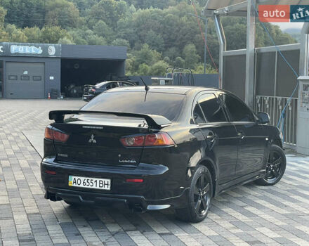 Чорний Міцубісі Lancer, об'ємом двигуна 2 л та пробігом 300 тис. км за 4600 $, фото 9 на Automoto.ua