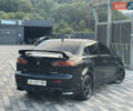 Чорний Міцубісі Lancer, об'ємом двигуна 2 л та пробігом 300 тис. км за 4600 $, фото 9 на Automoto.ua
