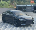 Чорний Міцубісі Lancer, об'ємом двигуна 2 л та пробігом 300 тис. км за 4600 $, фото 4 на Automoto.ua
