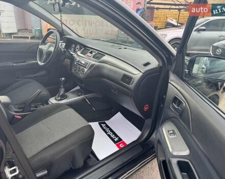 Мицубиси Лансер 2008 в Запорожье на Automoto.ua Черный Мицубиси Лансер, объемом двигателя 1.6 л и пробегом 316 тыс. км за 4290 $, фото 13 на Automoto.ua