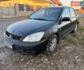 Чорний Міцубісі Lancer, об'ємом двигуна 1.6 л та пробігом 200 тис. км за 3199 $, фото 1 на Automoto.ua