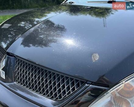 Чорний Міцубісі Lancer, об'ємом двигуна 1.6 л та пробігом 296 тис. км за 4200 $, фото 14 на Automoto.ua