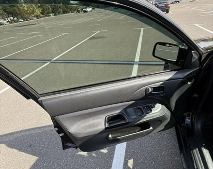 Черный Мицубиси Лансер, объемом двигателя 1.6 л и пробегом 321 тыс. км за 5000 $, фото 30 на Automoto.ua