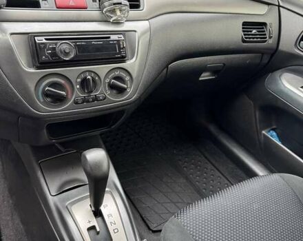 Чорний Міцубісі Lancer, об'ємом двигуна 1.6 л та пробігом 245 тис. км за 4500 $, фото 15 на Automoto.ua