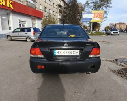 Черный Мицубиси Лансер, объемом двигателя 1.6 л и пробегом 358 тыс. км за 4300 $, фото 5 на Automoto.ua