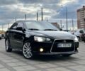 Чорний Міцубісі Lancer, об'ємом двигуна 2 л та пробігом 236 тис. км за 7900 $, фото 1 на Automoto.ua