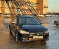 Черный Мицубиси Лансер, объемом двигателя 2 л и пробегом 248 тыс. км за 6600 $, фото 1 на Automoto.ua