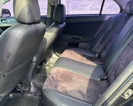 Чорний Міцубісі Lancer, об'ємом двигуна 1.5 л та пробігом 210 тис. км за 5500 $, фото 26 на Automoto.ua
