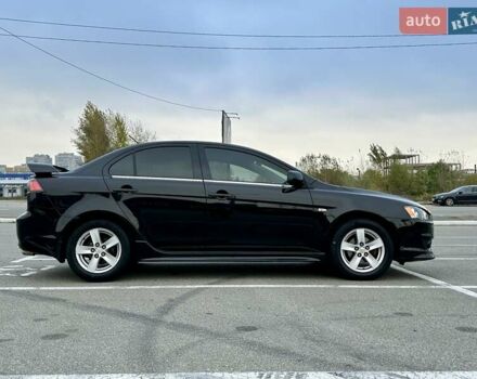 Чорний Міцубісі Lancer, об'ємом двигуна 2 л та пробігом 199 тис. км за 7900 $, фото 2 на Automoto.ua