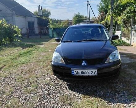 Чорний Міцубісі Lancer, об'ємом двигуна 1.6 л та пробігом 221 тис. км за 5200 $, фото 1 на Automoto.ua