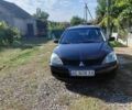 Чорний Міцубісі Lancer, об'ємом двигуна 1.6 л та пробігом 221 тис. км за 5200 $, фото 1 на Automoto.ua