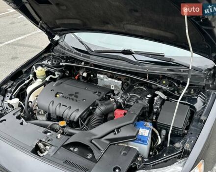 Чорний Міцубісі Lancer, об'ємом двигуна 2 л та пробігом 199 тис. км за 7900 $, фото 46 на Automoto.ua