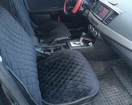 Мицубиси Лансер 2008 в Львове на Automoto.ua Черный Мицубиси Лансер, объемом двигателя 2 л и пробегом 210 тыс. км за 6500 $, фото 5 на Automoto.ua