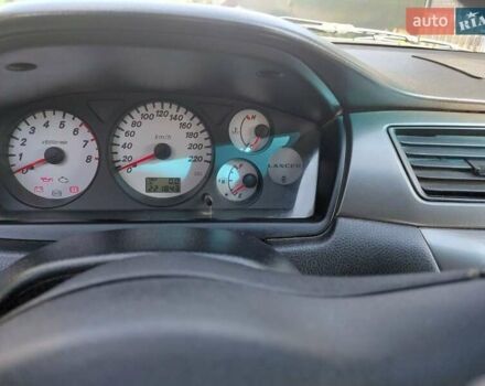 Чорний Міцубісі Lancer, об'ємом двигуна 1.6 л та пробігом 221 тис. км за 5200 $, фото 4 на Automoto.ua