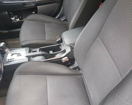 Черный Мицубиси Лансер, объемом двигателя 2 л и пробегом 192 тыс. км за 6350 $, фото 16 на Automoto.ua