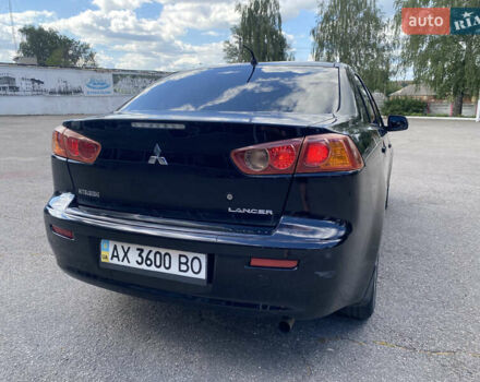 Черный Мицубиси Лансер, объемом двигателя 2 л и пробегом 200 тыс. км за 5500 $, фото 3 на Automoto.ua