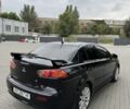 Черный Мицубиси Лансер, объемом двигателя 2 л и пробегом 200 тыс. км за 6800 $, фото 2 на Automoto.ua